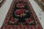 Hand woven in wool originating from Turkey circa 1950-1960, this item is a vintage floral Bessarabian kilim, affording a...