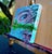 I'll Be Your Mirror-Logan-7 Lakes, France by Amanda Seckington | Acrylic on panel Eye reflection in water with greenery. For Sale - Image 4 of 4