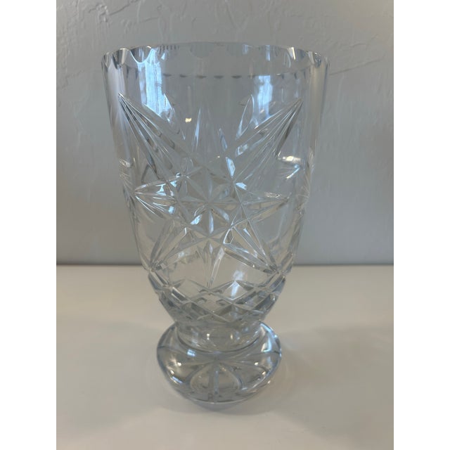 Large cut Crystal vase with stars and buzz saw patterns. Heavy cut Crystal excellent condition.