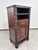 Art nouveau cabinet with a shelf, decorated with distinctive floral carvings. Professionally stained and repolished. The...