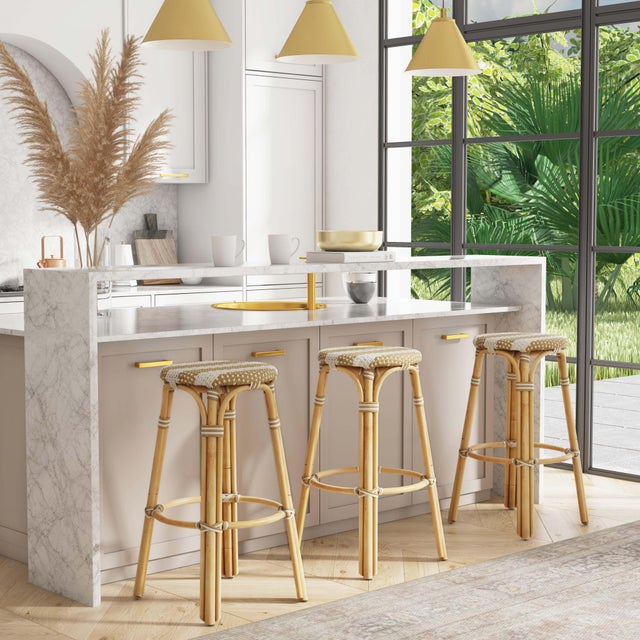Evoking images of sidewalk tables in the Cote d'Azur, barstools like this will give your kitchen or patio the casual...