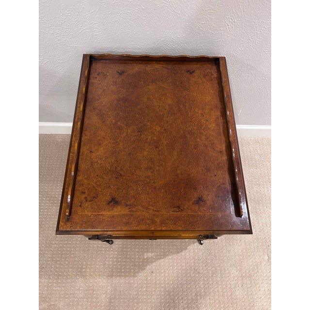 Beautiful multi-tier accent table features a flame mahogany veneer top, a scalloped gallery edge, and a spacious lower...