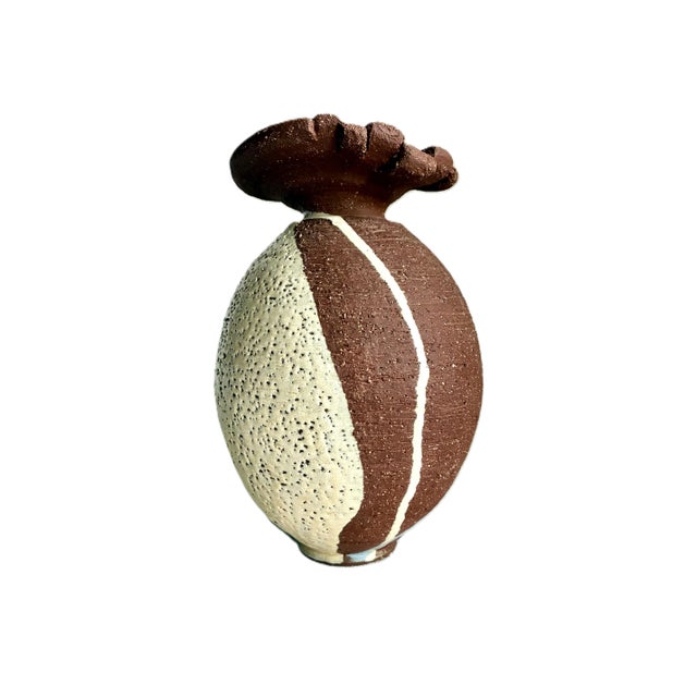 Elevate your art pottery collection with this exceptional piece of vintage 1970s mid-century modern design. This signed...
