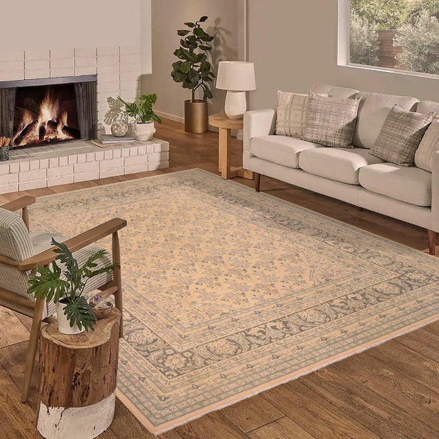 Enhance the ambiance of your home with this magnificent Persian-influenced Turkish hand-knotted rug made by skilled...