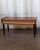 A refined Danish rosewood side table by Pedersen & Hansen, produced in the 1970s. The richly grained rosewood, low...