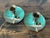 Pair of vintage enameled candlestick holders with a duck couple on a teal background. Most items found at Pub & Oasis are...