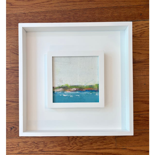 Acrylic and pastel on canvas, mounted on cradled wood panel, framed in a duo style white wooden frame, 13 x 13 x 1.5. Back...