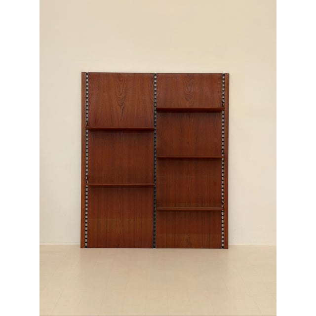Vintage Modular Wall Bookcase in Teak, 1970s, in Very Good conditions. Designed 1970 to 1979 I have official proof of...