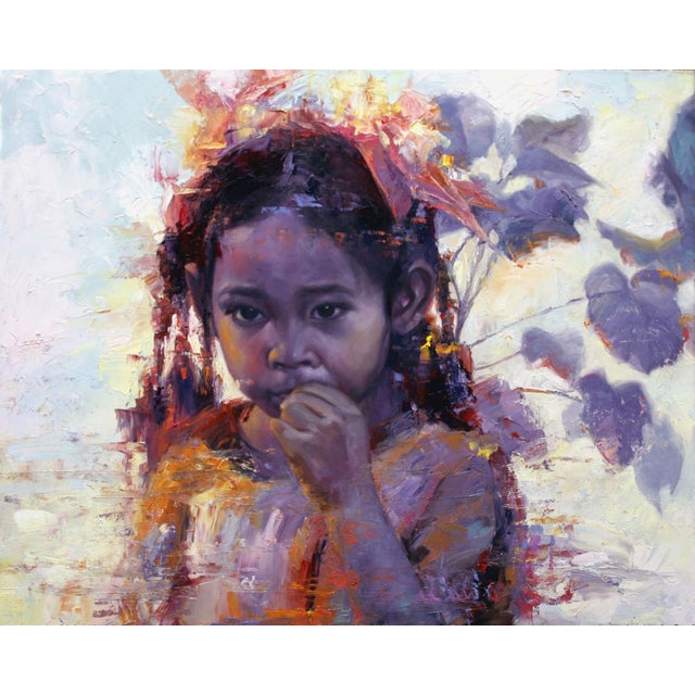 This oil painting depicts a young Thai girl, her expression contemplative as she gazes directly at the viewer. Rich,...