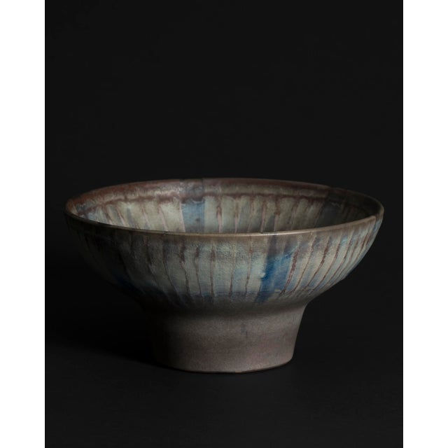 A sculptural stoneware fruit bowl designed by Fridegart Glatzle for Karlsruher Majolika in West Germany during the 1970s....
