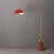 Built with a weathered brass steel body and a dark walnut wood base, the Tambo Arc Lamp is a Mid-Century Modern...