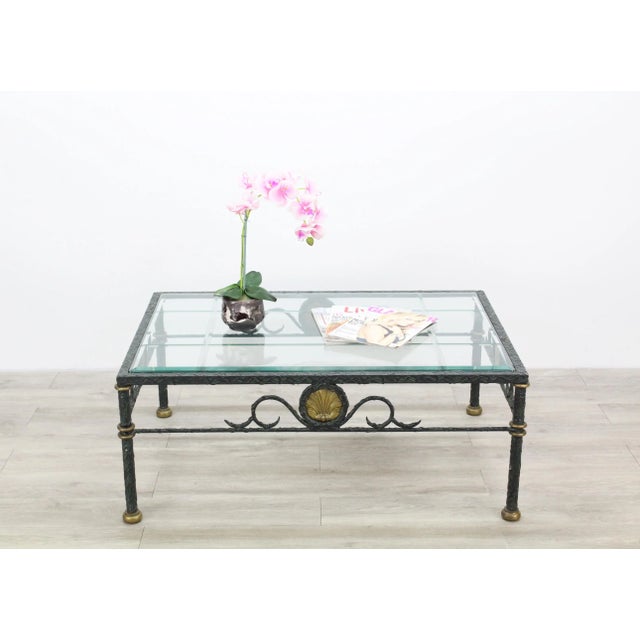 Stunning metal side side table with brass accent, this lovely table is in great vintage condition the glass top has a chip...