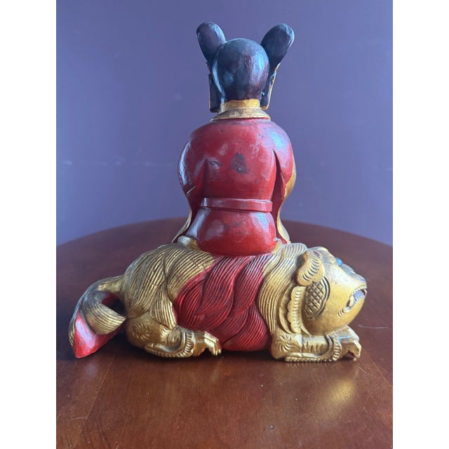 Chinese Chinese Carved Wooden Quan Yin or Ancestor Figure on Foo Dog Incense Holder. Beautiful Carving Sang De Bouef Undertones With Gold Overlay. For Sale - Image 3 of 10
