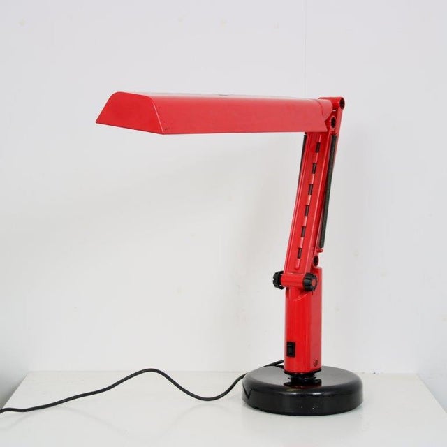 An eye-catching desk lamp, model “Lucifer”, designed for Fagerhult in Sweden around 1970. This unique piece is made of...