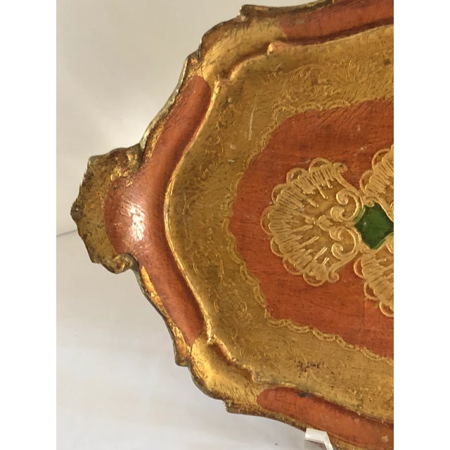 Hollywood Regency ornate Florentine wood tray. Circa 1960’s Orange , gold and green double handles . Measures 17” x 11.5”...