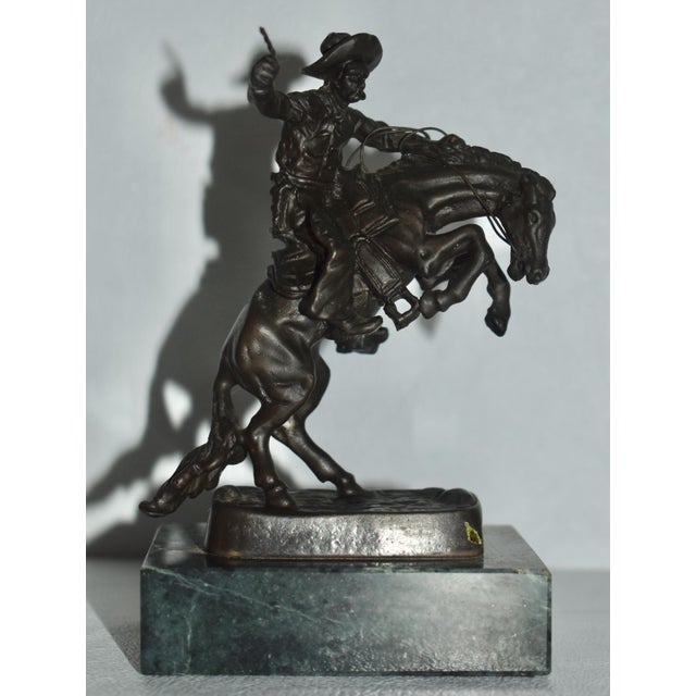 Vintage (1980's) Rattlesnake Bronze Sculpture Miniature Statue by Frederic Remington has a Western - Modern Style. Made of...