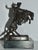 Vintage (1980's) Rattlesnake Bronze Sculpture Miniature Statue by Frederic Remington has a Western - Modern Style. Made of...