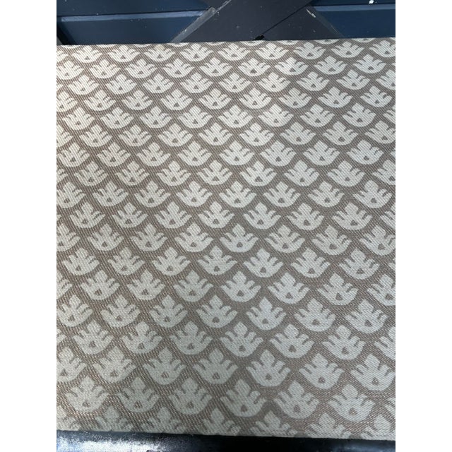 A square shade handmade with Fortuny’s iconic printed fabric, with a euro fitting. 2 are available