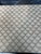 A square shade handmade with Fortuny’s iconic printed fabric, with a euro fitting. 2 are available