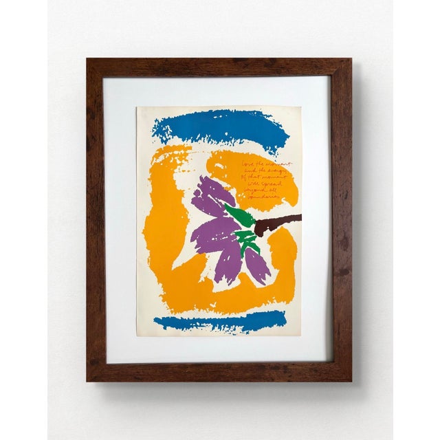 The artwork was created in 1977 and is part of her "moments" series. The text in the image reads: "love the moment and the...