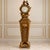 Bring timeless grandeur to your interior with this impressive French-inspired pedestal clock, featuring a rich brown...