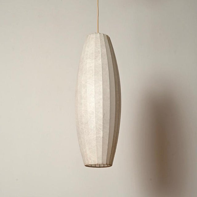 Spectacular large seed pod-shaped cocoon pendant. This incredibly rare piece was designed by achille castiglioni and made...