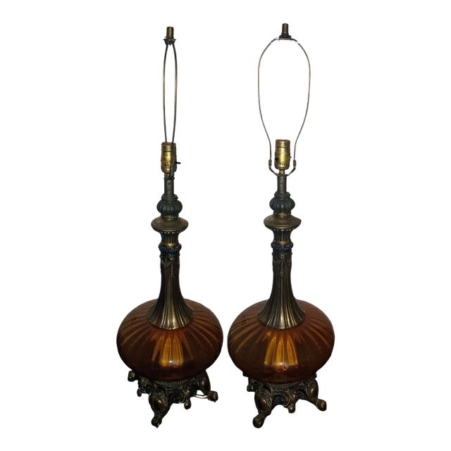 1970s Touch of Vintage Glamour: A Pair of Mid-Century Amber Glass Lamps For Sale