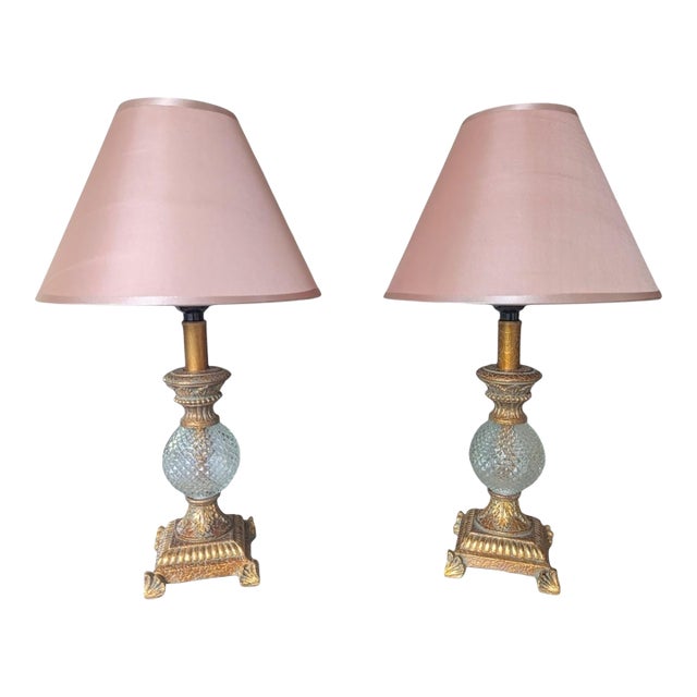 Hollywood Regency Gilded Gold and Faux Crystal Lamps With Pink Lampshades- A Pair For Sale