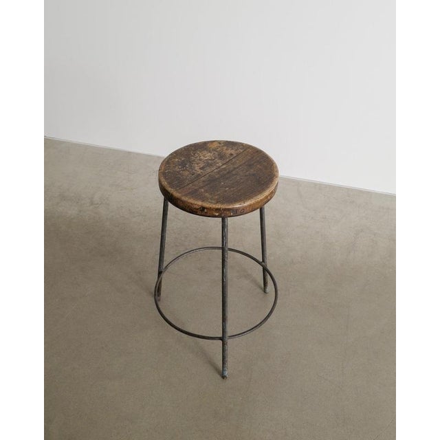 Rare French mid century wooden high bar stool by Pierre Jeanneret in dark stained teak and patinated iron produced for...