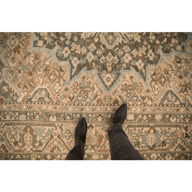 :: Concentric center medallion with intricate lace-like relief in sharp serrated contour bearing interior floral buds and...