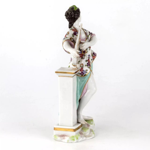 Porcelain figure "Girl with a lyre". Stamp of manufacturer Dresden area Porcelain Decorating Studio, 1850 - 1880.