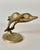 Who doesn’t love dolphins? A pair of mid-century brass dolphins leaping. Original patina, but could be polished. Charming...