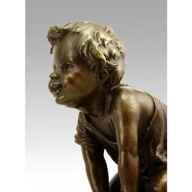Patinated Bronze Sculpture of Seated Child For Sale - Image 4 of 5