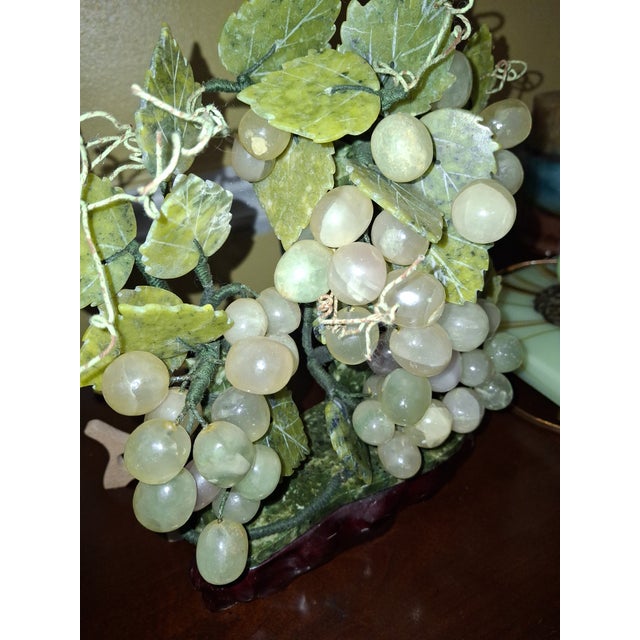This is a truly exquisite rare beautiful piece ,Hand-Carved Jadeite jade Grapevine Bonsai Tree. Each and every grape and...