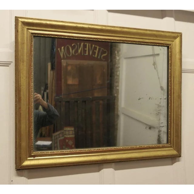 Old Rectangular Gilt Mirror The mirror has a lovely age darkened moulded Gilt frame, it is in good condition for its age,...