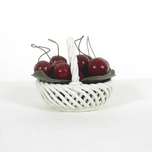 Gorgeous Italian white ceramic basket filled with glossy red ceramic cherries with wire stems. There is a tiny chip on the...