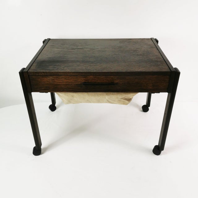 Table-cabinet, Denmark, 1960s. It features a simple, spacious form – Mid-Century Modern. Made of mixed wood, it features a...