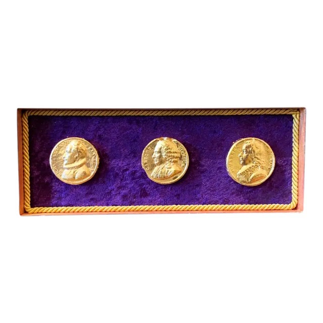 Custom grand tour Style arrangement with French profile intaglio collection. Set of three French plaster gilded profile...