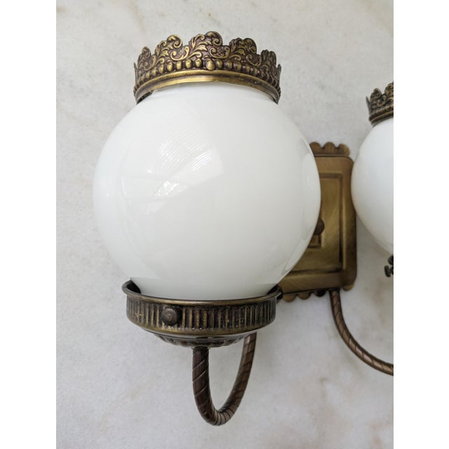 Victorian Vintage Milk Glass Globe Two Light Aged Brass Sconce For Sale - Image 3 of 9