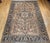 "An exceptional antique Heriz rug, masterfully hand-knotted and celebrated for its bold geometric composition and enduring...