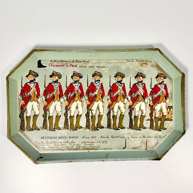 We love this vintage metal tray depicting a French Two Bridges Regiment of Foot Rifflemen from an Expedition on September...