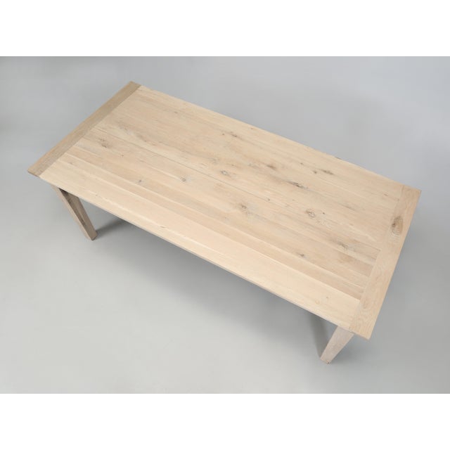 Dining Table that comfortably seats (8) and constructed from Elm Wood and Imported from England almost 20-years ago. You...