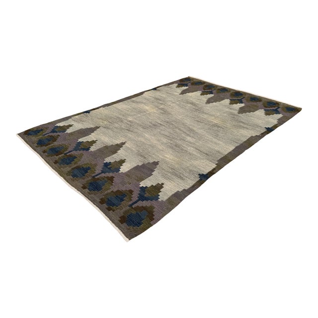 A swedish flatweave kilim rug designed by judith johansson (1916–1993), titled norrviken, circa 1950. woven in wool with a...