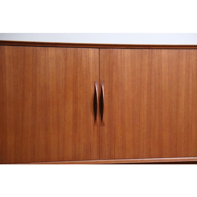 Elegant model 75 sideboard designed by arne vodder for sibast møbler, produced in denmark during the 1960s. Executed in...