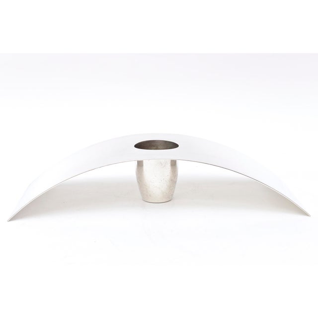 This piece of beautiful Italian silver-plate sculpture and art for the table is by Lino Sabattini and from the 80's.It is...