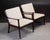 Set of two Ole Wanscher PJ112 mahogany lounge chairs produced by P. Jeppesens Møbelfabrik. Frames and upholstery of the...