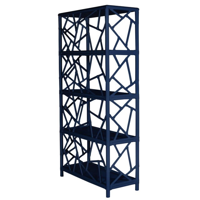 In a whimsical geometric pattern, this étagère features a rattan frame, rawhide bindings and four wood shelves. The...