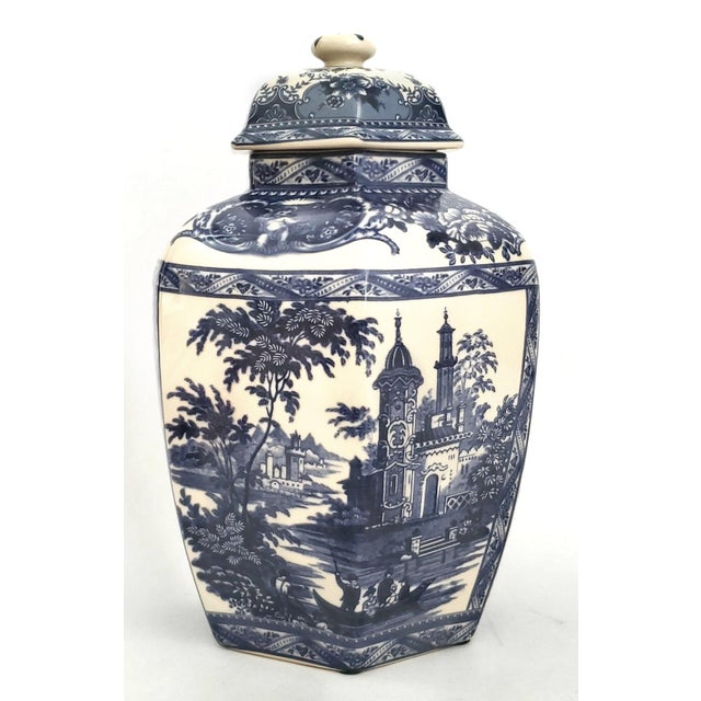 Offering a vintage British Staffordshire style blue and white porcelain ginger jar, circa Late 20th century. This...