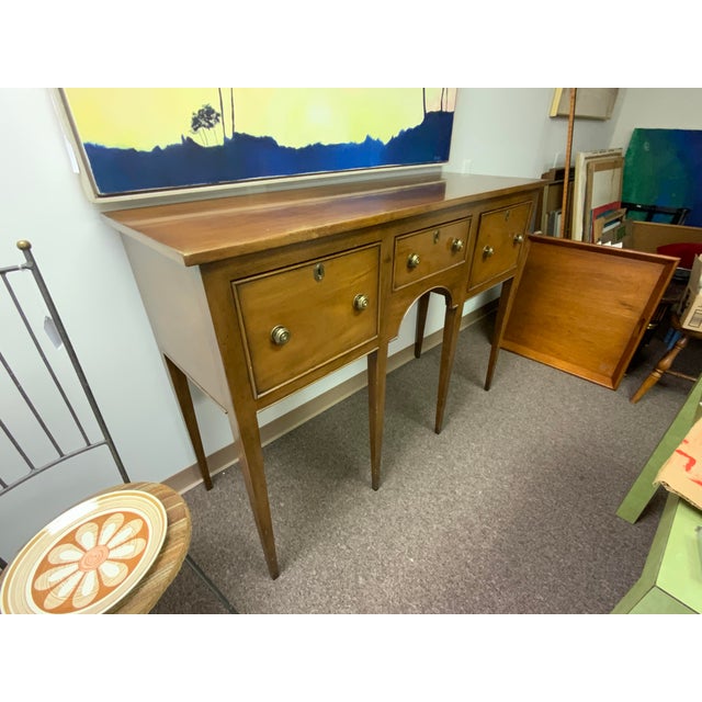 Colonial Williamsburg reproduction huntboard, made by Kittinger, circa 1970’s. A hand crafted replica of an antique...