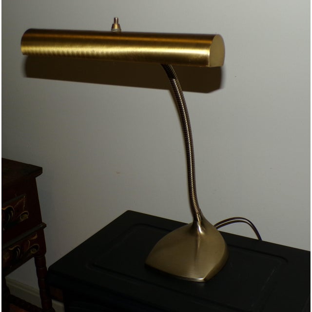 Vintage Mid-century modern Brass gooseneck task lamp by The Laurel Lamp Co., c.1950's. Brushed Brass with heavy weighted...